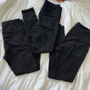 Three pairs of black leggings